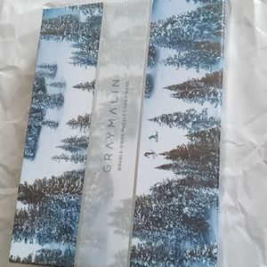 Gray Malin 500 pc winter skiing double sided puzzle